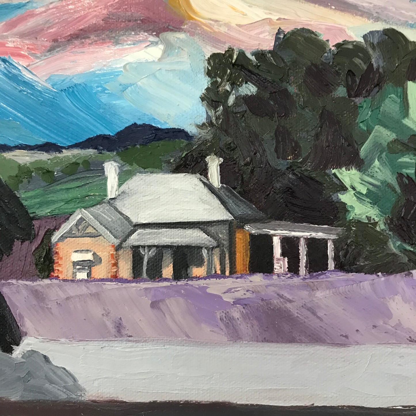 Painting of a house with trees and a colorful background