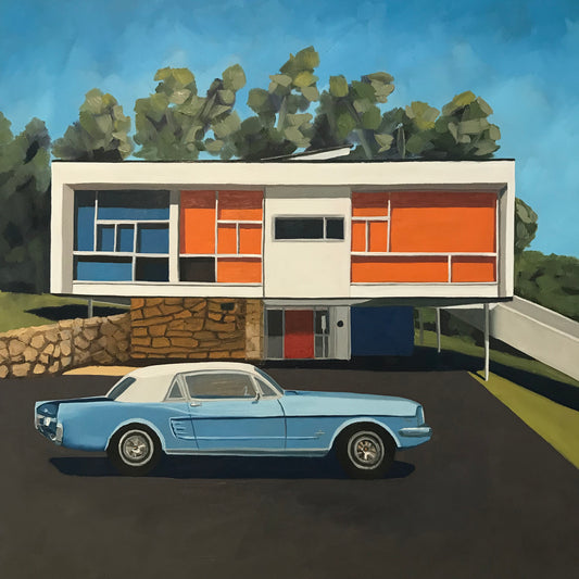 Modern house with colorful facade and blue car in front