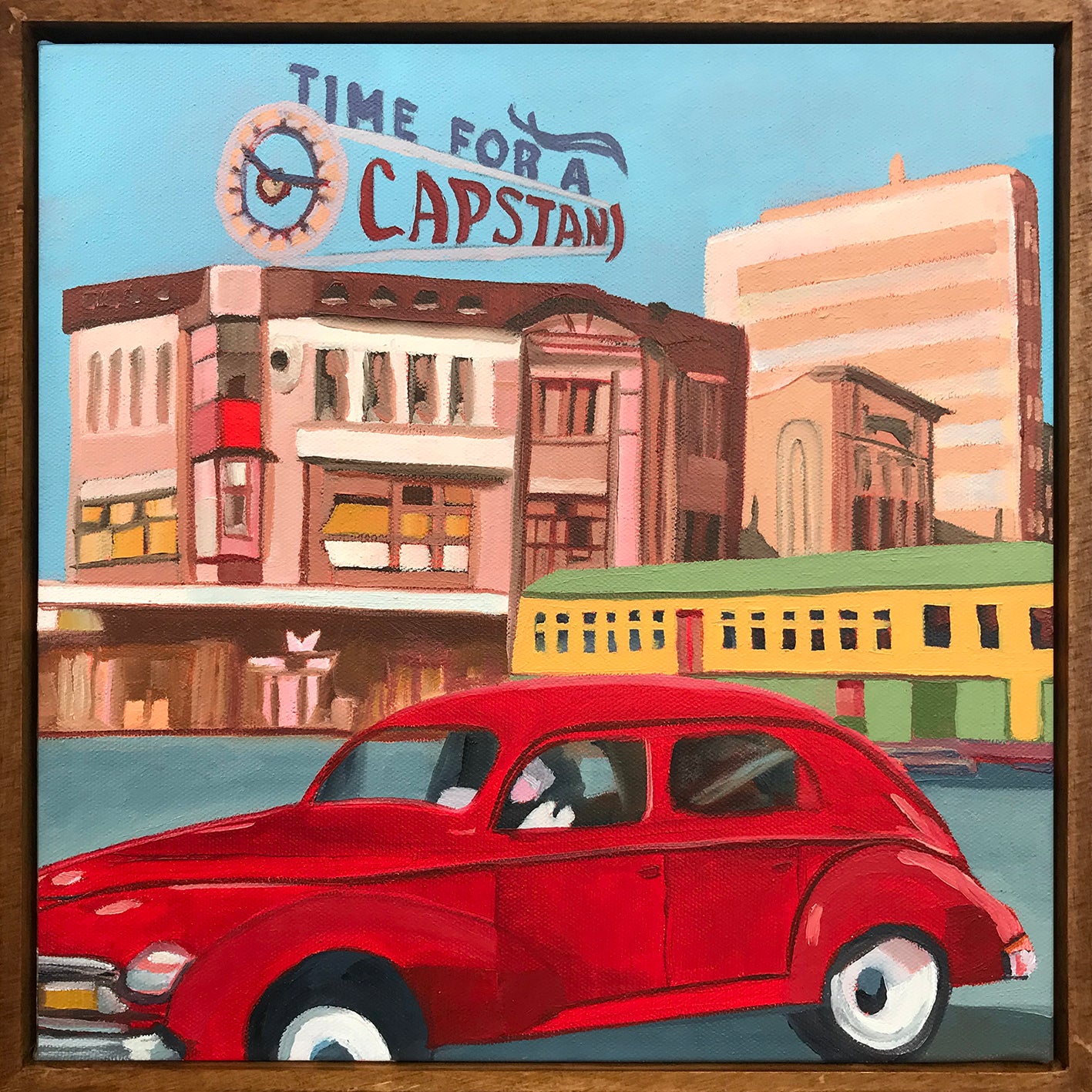Vintage red car in front of a cityscape with 'Time for a Capstan' sign.