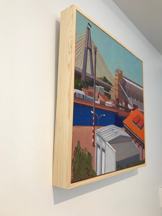 Wooden box with a colorful painting of a cityscape on top